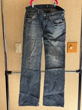 7 For All Mankind Men’s Bootcut Jeans Size 34 Medium Wash Faded Denim